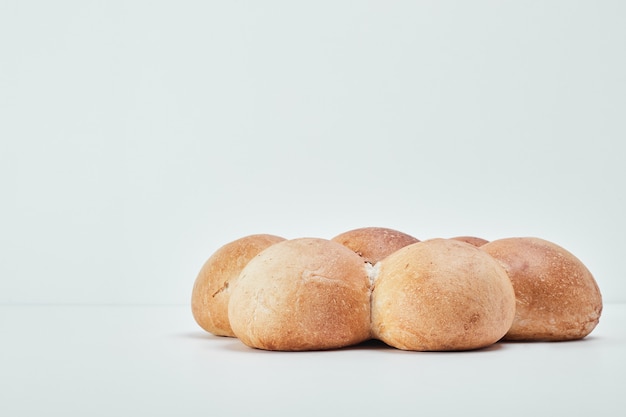 Sweet bakery buns in floral shape, side view.