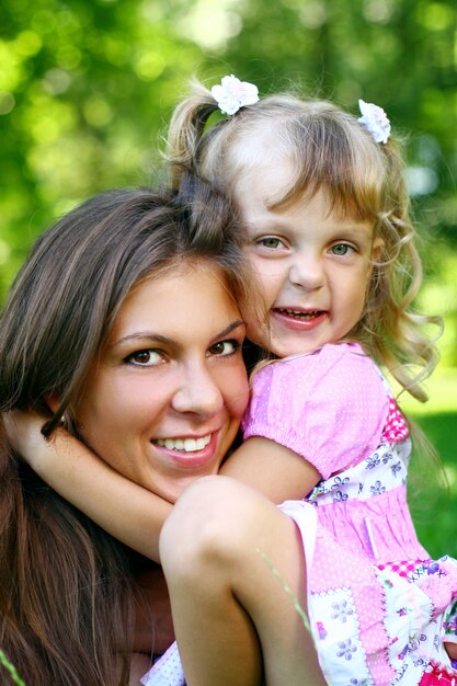 Sweet and beautiful girl with mom
