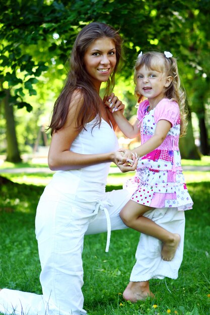 Sweet and beautiful girl with mom