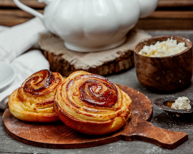 Sweet buns with sugar glaze