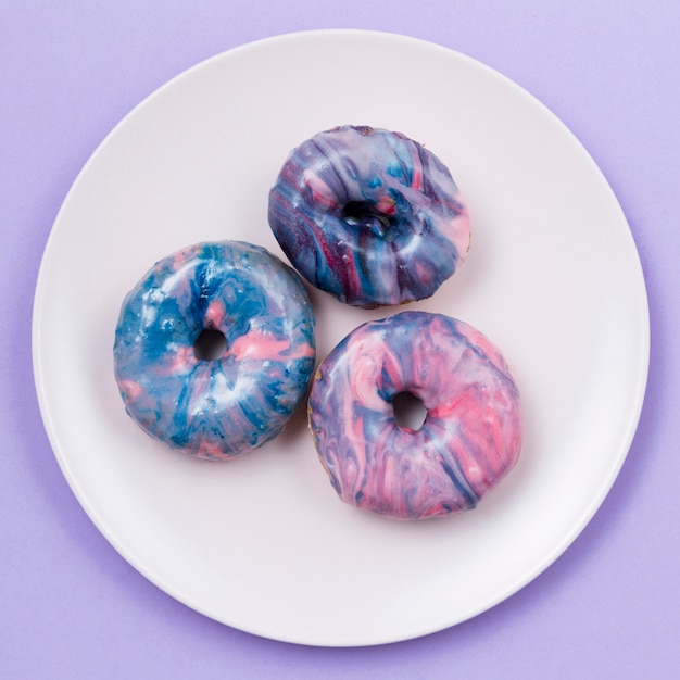 Sweet colorful donuts close up