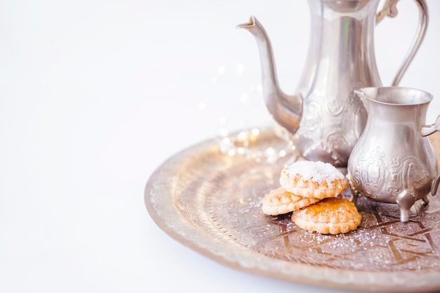 Sweet cookies and metal utensil 