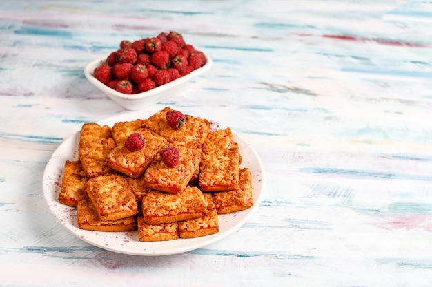 Sweet delicious raspberry jam cookies with ripe raspberries,top view