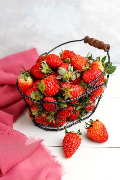 Sweet delicious strawberries in basket,top view