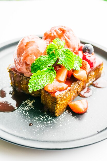 Sweet dessert with honey toast with strawberry and jam