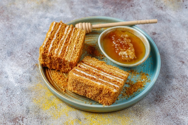 Sweet homemade layered honey cake with spices and nuts.