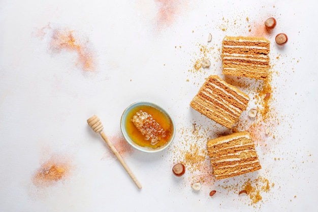 Sweet homemade layered honey cake with spices and nuts.