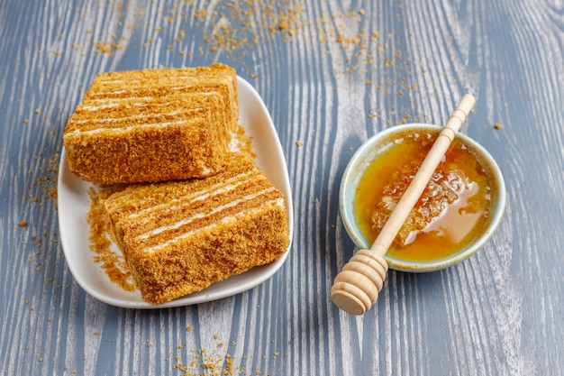 Sweet homemade layered honey cake with spices and nuts.