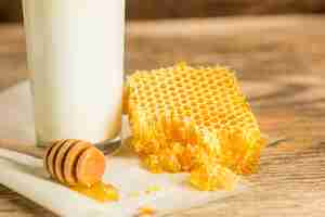 Free photo sweet honeycomb on wooden table