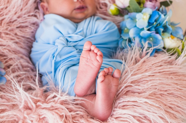 Sweet little newborn on blanket