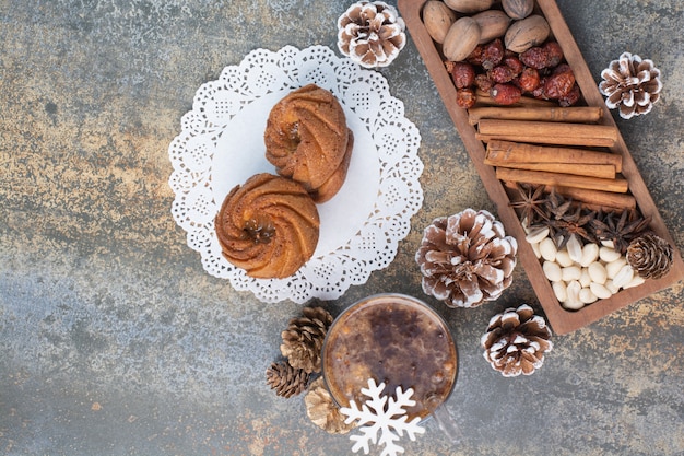 Sweet pastries with pinecones and cup of coffee. High quality photo