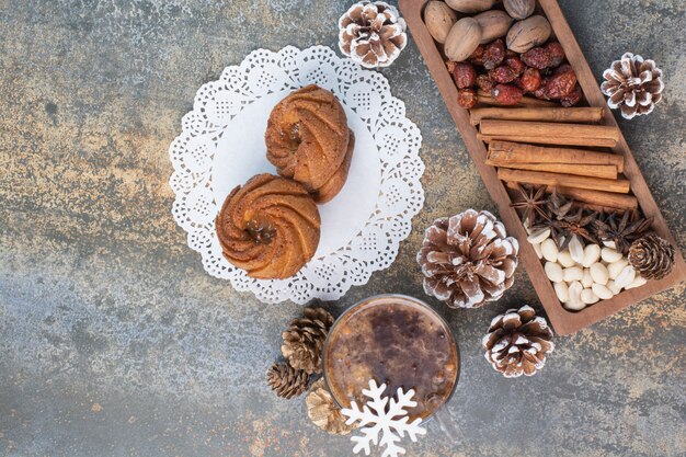 Sweet pastries with pinecones and cup of coffee. High quality photo
