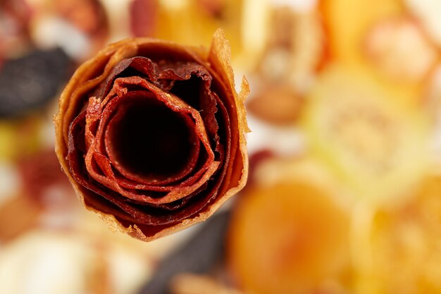 Sweet pure fruit pastille in rolls with berries