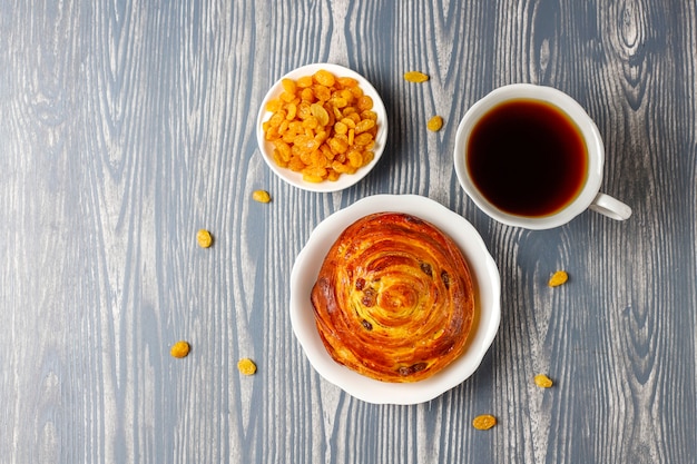 Sweet round french buns with raisins.