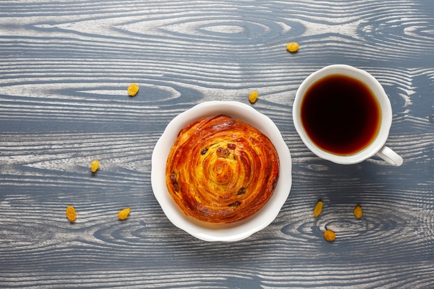 Free photo sweet round french buns with raisins.