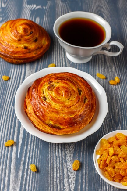 Sweet round french buns with raisins.