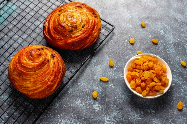 Sweet round french buns with raisins.