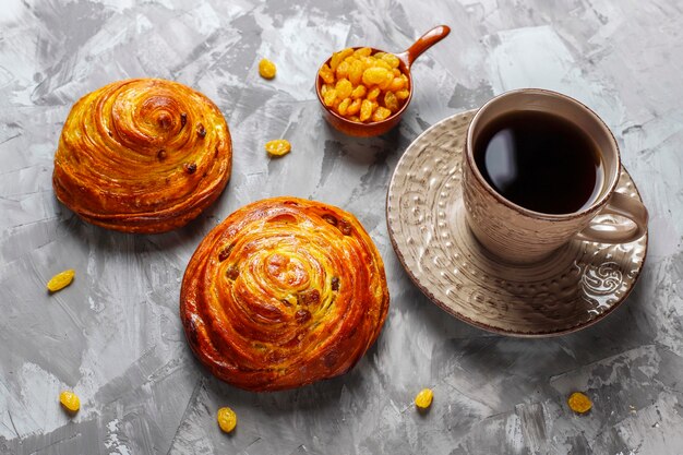 Free photo sweet round french buns with raisins.