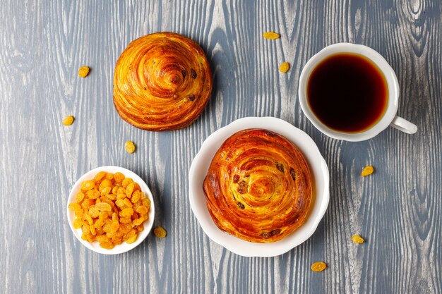 Sweet round french buns with raisins.