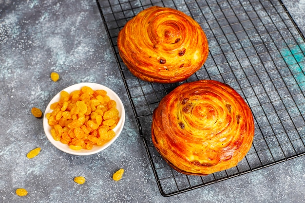 Sweet round french buns with raisins