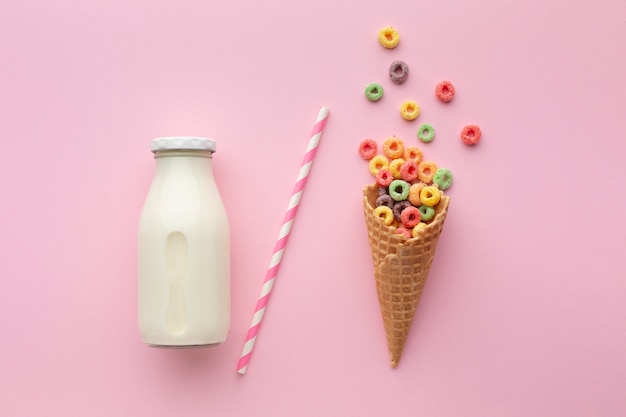 Free photo sweet sugar cone with colorful cereal