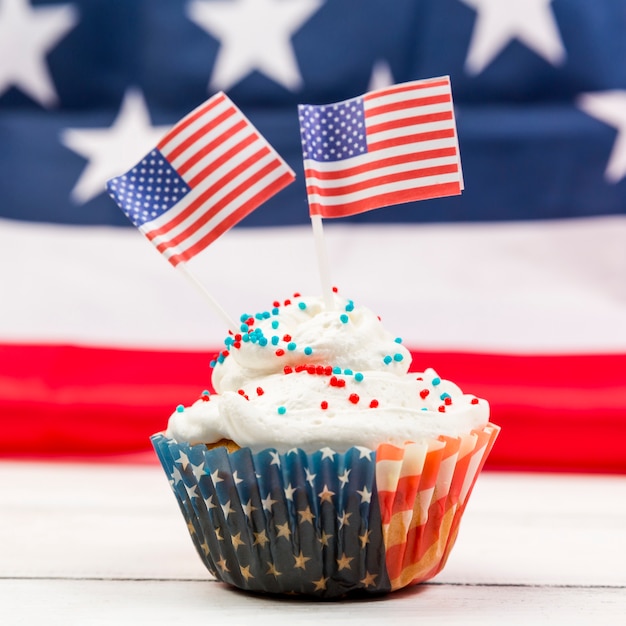 Sweet whipped cream cupcake with American flags