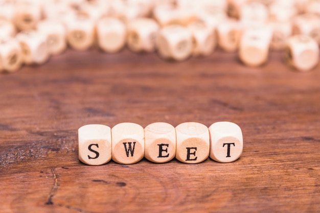 Sweet word made with wooden dices