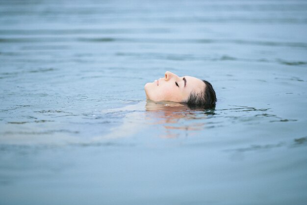 Swimmer in the lake, body in the water