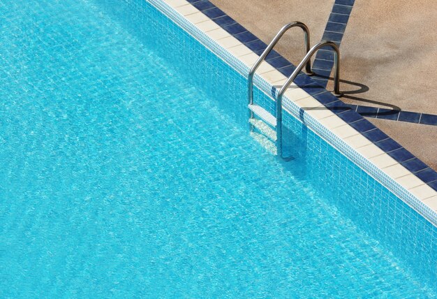 swimming pool with stair at hotel