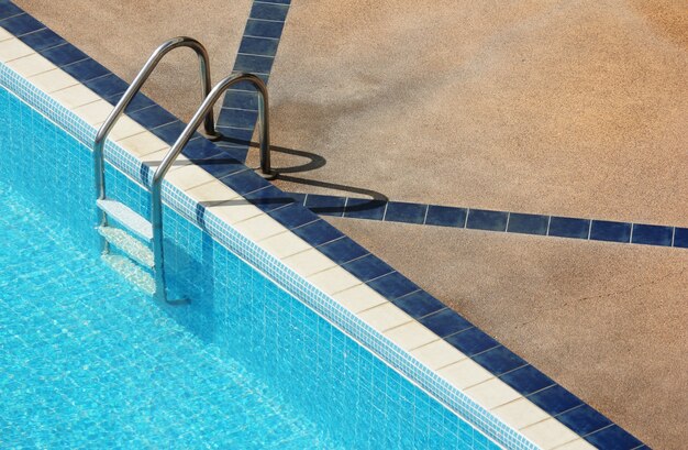 swimming pool with stair at hotel