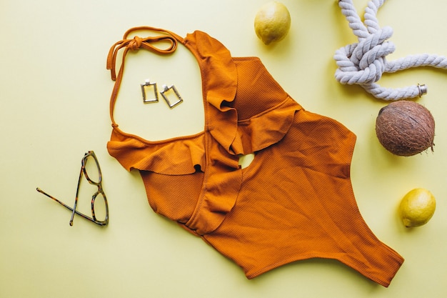 Free photo swimsuit on yellow background isolated