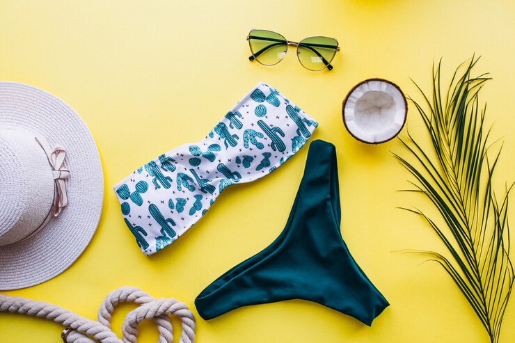 Free Photo swimsuit on yellow background isolated