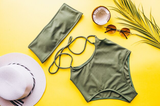 Swimsuit on yellow background isolated