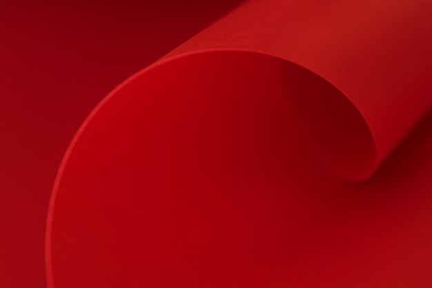 Swirl of elegant red paper copy space surface