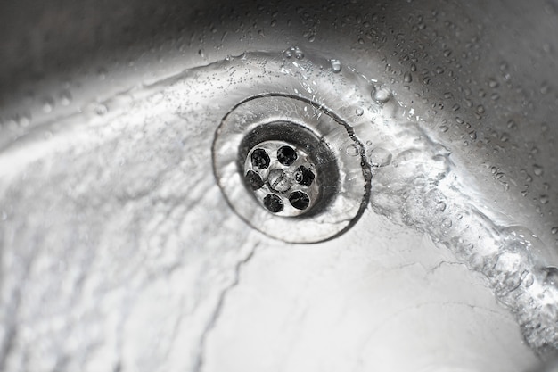 Swirl of water going down the sink