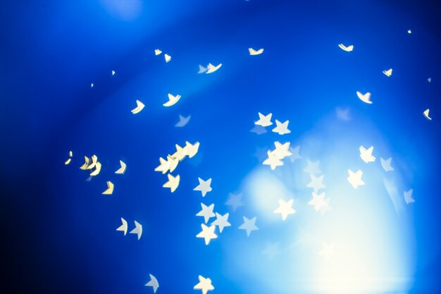 Swirl of white stars on blue