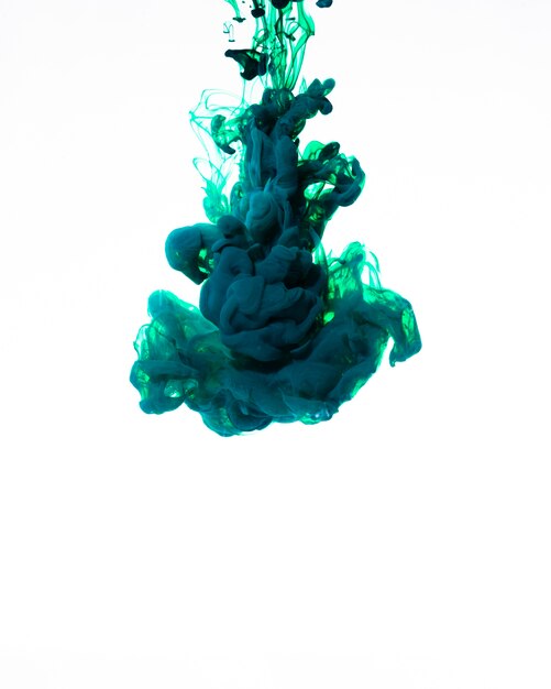 Swirling blue ink cloud in motion