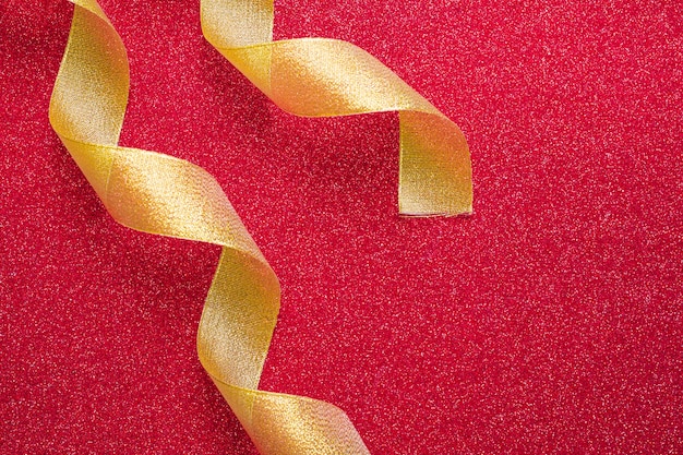 Swirling ribbons on red background