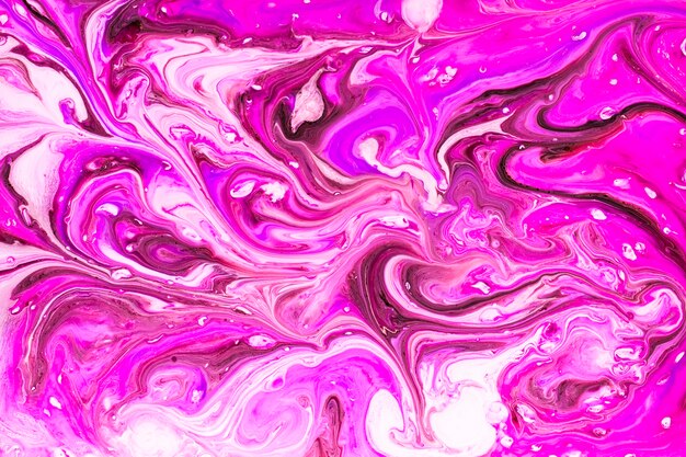 Swirls of paint on liquid