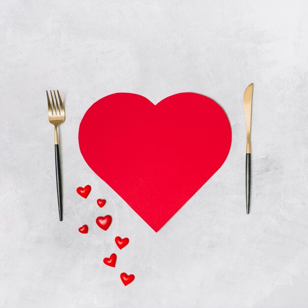 Symbol of heart and cutlery 