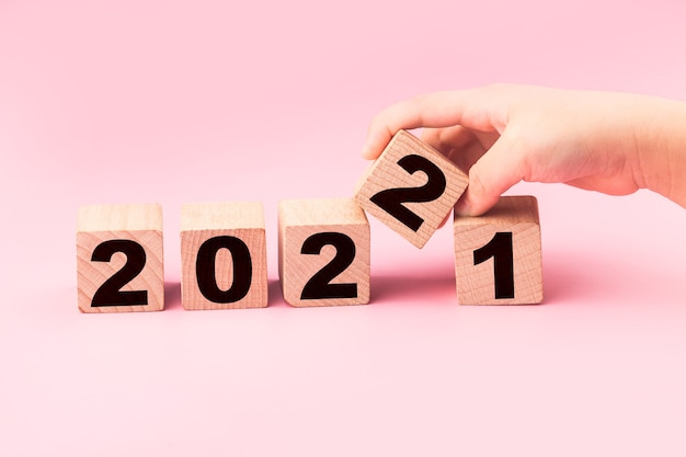 Symbolize the change from 2021 to the new year 2022 2022 happy new year concept