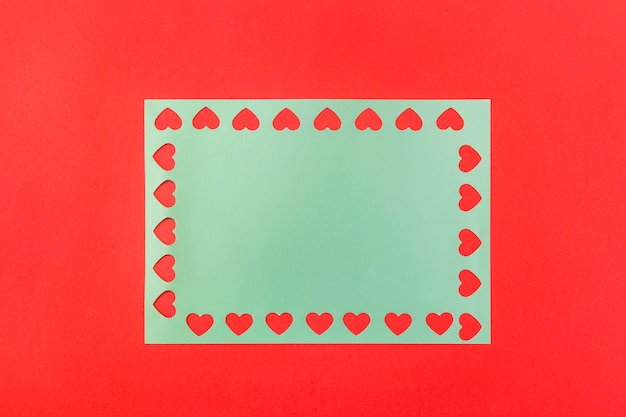 Symbols of heart on blue paper