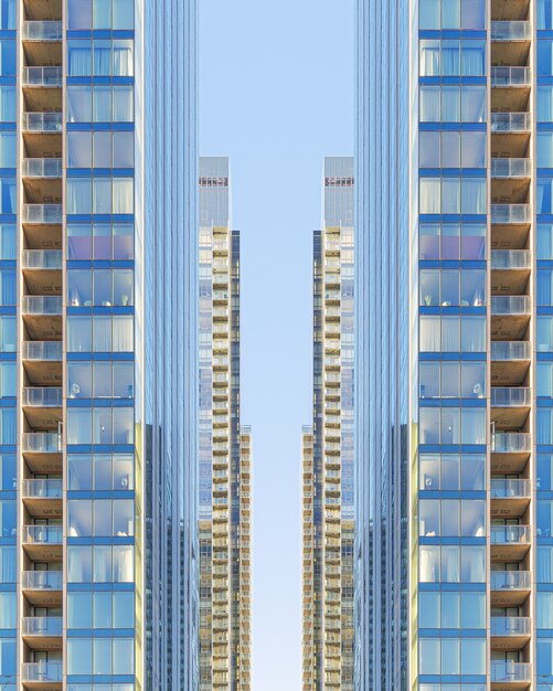 symmetrical glass buildings in downtown Montreal