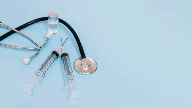 Syringes near stethoscope