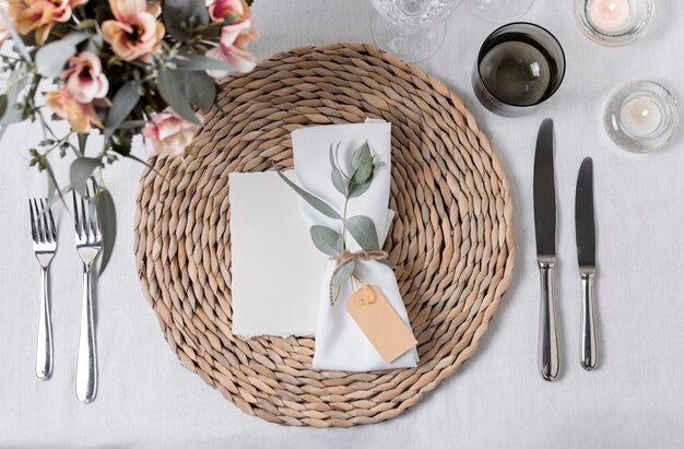 Table arrangement with flowers flat lay