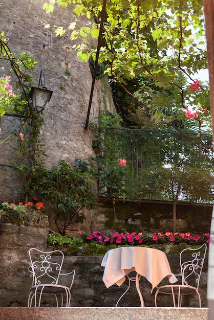 Table and chairs in italian garden