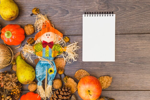 Table covered with vegetables and notepad