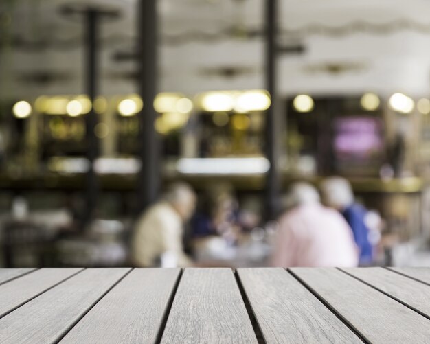 Table surface looking out to men in bar