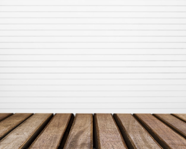 Free photo table surface looking out to white striped background