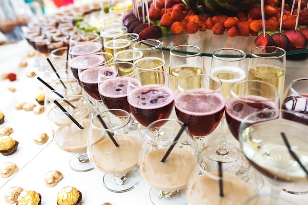 Table with alcoholic beverages and chocolates